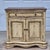This is a vintage French country style cabinet attributed to Hooker Furniture from its Seven Seas collection. The cabinet...