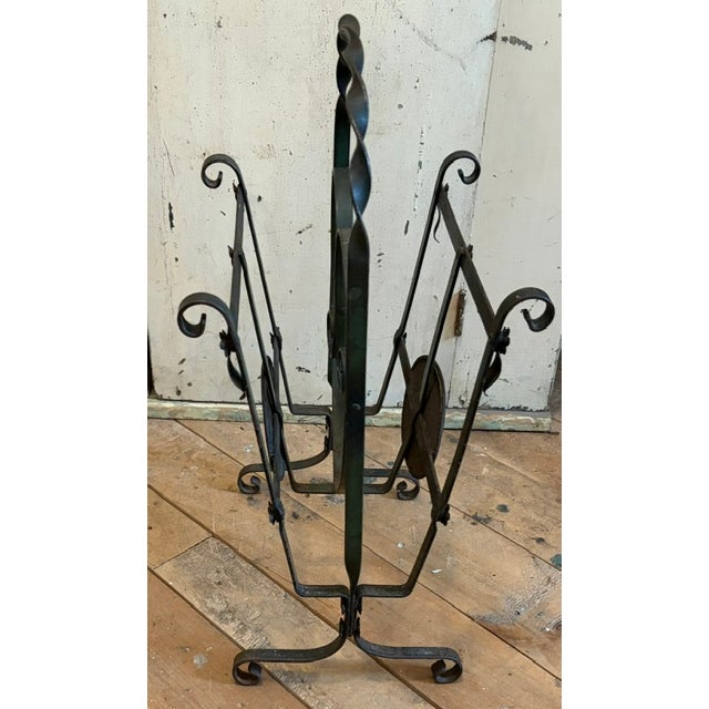 French Country Early Wrought Iron Magazine Rack With a Heart Shaped Design and Painted Floral Medallion For Sale - Image 3 of 5