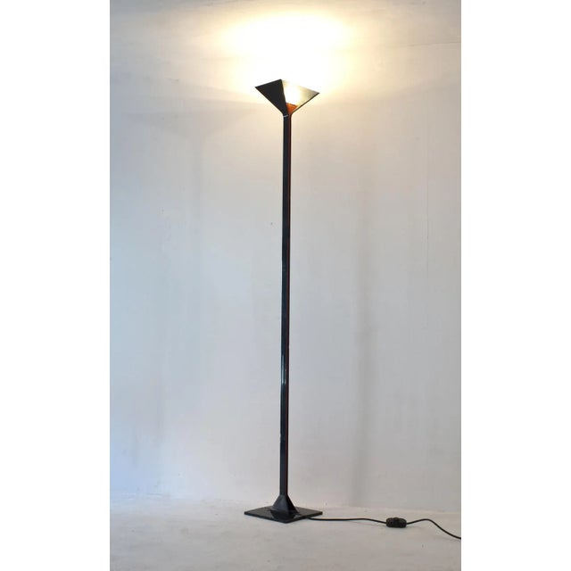 This is an early version of the lamp. It has a dimmer in the rod. This piece has an attribution mark, I am sure that it is...