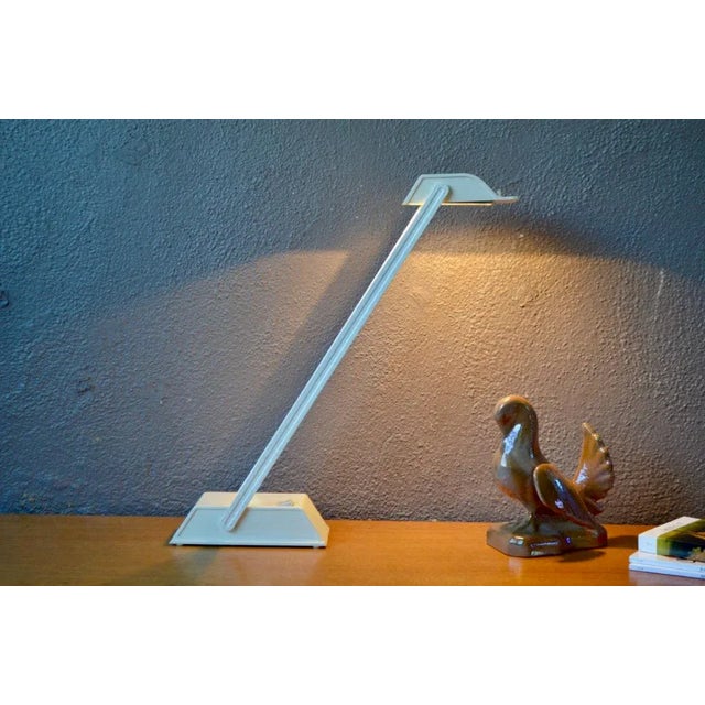 This lamp is rhyming precision lighting with minimalist design. The Osram Halostar office lamp is a production of the 80s....