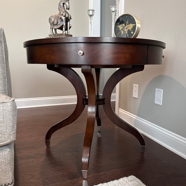 This Ethan Allen Wilshire Rent Table (Model 39-8315) is an absolute masterpiece of craftsmanship from the celebrated...