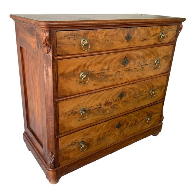 This beautiful chest circa 1700s is a William and Mary diminutive crossbanded, figured walnut chest of drawers resting on...