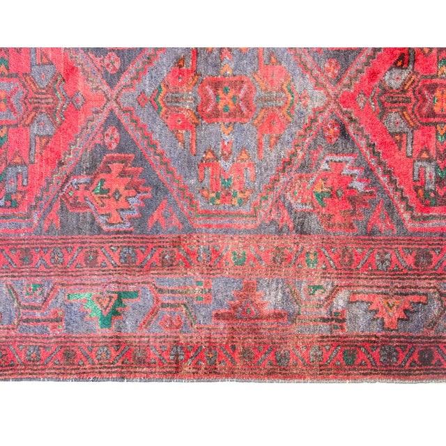 This mid-20th century Persian Mazlaghan rug is a vibrant example of traditional craftsmanship from the Mazlaghan region in...