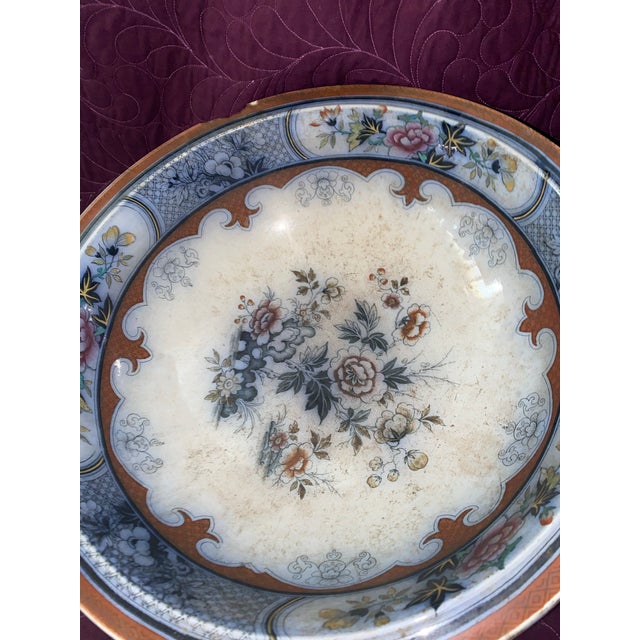 Imari ware is a style of Japanese porcelain characterized by its distinctive blue and white underglaze, often accented...