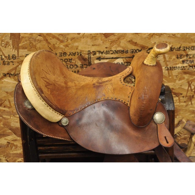 Vintage Circle Y Brand Brown Leather & Suede 14 inch Seat Barrel Horse Western Saddle. Stand not included. Circa Late 20th...