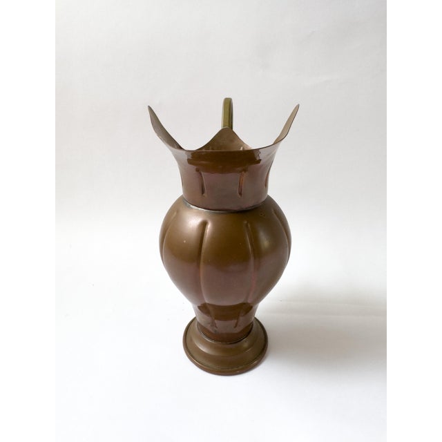 A distinctive vintage French copper pitcher from Villedieu-les-Poêles, Normandy, a historic centre of French copper...
