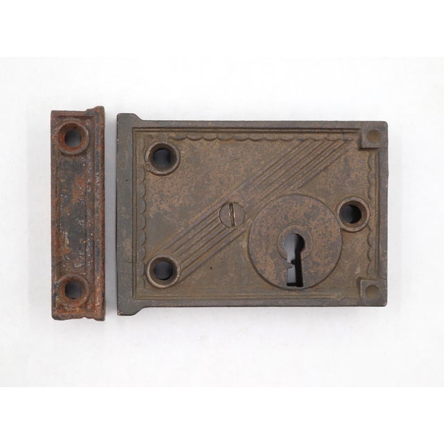 Antique rim lock set made of cast iron with a black finish. A compatible key is included to use on all three locks. The...