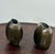 A superb and rare pair of small Art Deco metal vases with an architectural design and remarkable surface finish. Details &...