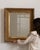 Carved giltwood mirror in Antique Gold. Finished in antique gold, this carved giltwood mirror is distinguished by...