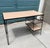 This is a vintage mid-century modern atomic-age student desk featuring a light-colored laminate (Formica/melamine) top,...