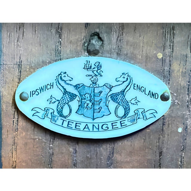Manufactured by Teeangee of Ipswich, England. Believed to be crafted of solid oak, this charming English side cabinet...