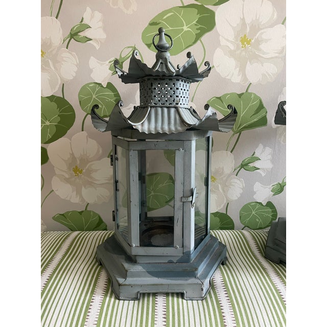 Indoor or Outdoor these pagoda lanterns have a ring at the top if hanging were desired. They are 6-sided with metal...