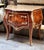 Elevate your interior with this stunning French Louis XV style commode, a sophisticated piece designed to bring timeless...