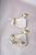 Pair of french art deco wall sconces from the 1940s. Each has a shield-shaped bevelled mirror backplate, a curved clear-...