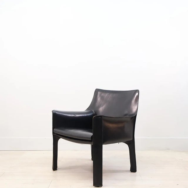 Mario Bellini for Cassina 'Cab' chairs. Model no 414. Stitched black leather. Zips onto a metal frame. In very good...