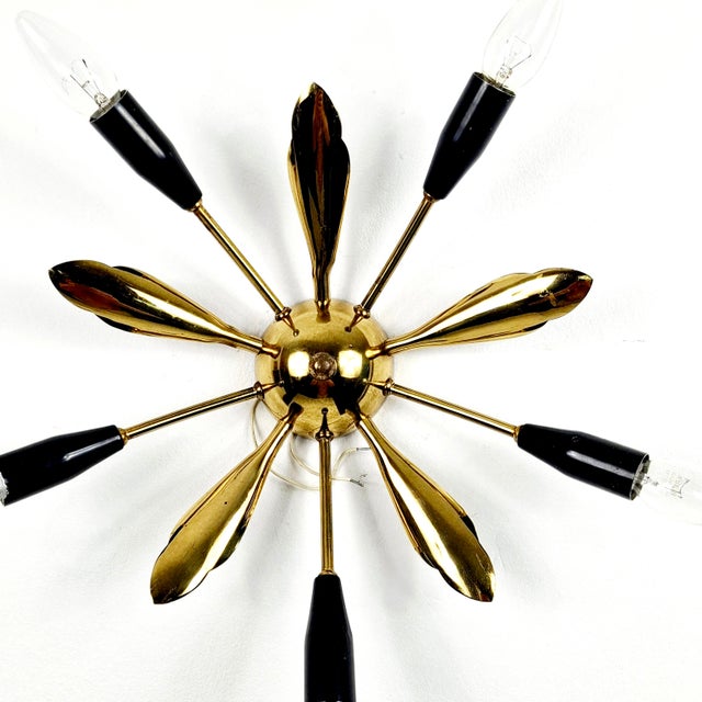 This beautiful, five-armed ceiling lamp is an absolute design classic of the mid-century era. It captivates with its...