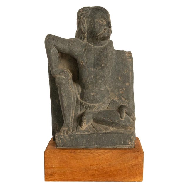 A finely carved Ancient Gandharan statue of Atlas, Kushan Empire, 2nd-3rd century CE. The Gandharan "Atlas figure" is...