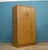 A freestanding oak wardrobe from G Plan from the Brandon range - circa 1950s Featuring a hanging rail This piece has an...