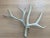 A pair of decorative vintage natural whitetail deer antler specimens