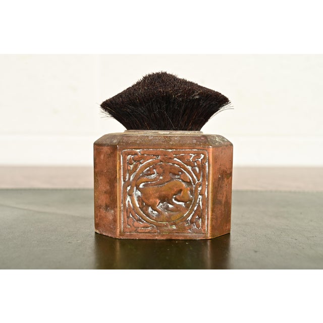 A gorgeous antique Arts & Crafts or Art Deco bronze pen brush or pen wipe featuring Zodiac designs By Tiffany Studios...