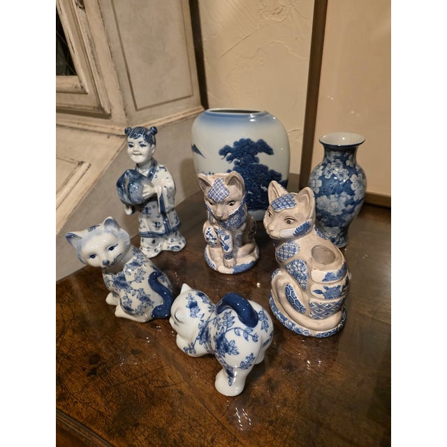 Collection of seven blue and white Chinese and Japanese porcelain objects from the 1990's.