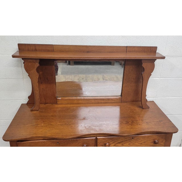 This is a gorgeous antique oak dry sink, server, or buffet, or dresser with mirror. Features three dovetailed drawers, a...