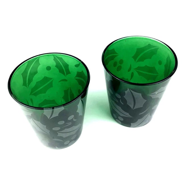 Pretty little deep green glasses with a festive Holly decoration all over design. Perfect for juice or shots. You can also...