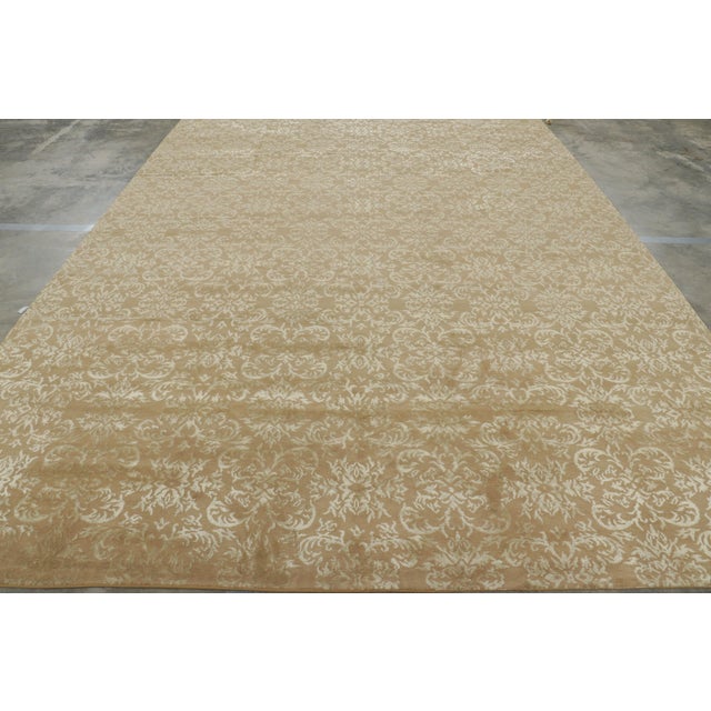 Hand-knotted in wool and silk in our most luxurious Nepalese pile, this 10x13 transitional rug is an addition to the...