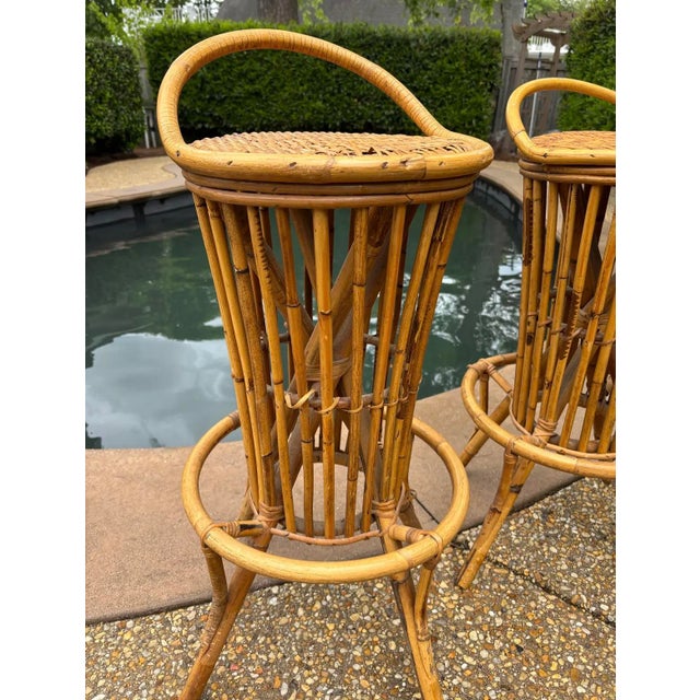 A rare pair of mid twentieth century Italian bamboo barstools with “tiki bar” influence. These stools are not marked and...