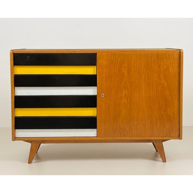 An iconic u-458 sideboard by jiří jiroutek, produced in the 1960s in former czechoslovakia. part of the famous interiér...