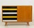 An iconic u-458 sideboard by jiří jiroutek, produced in the 1960s in former czechoslovakia. part of the famous interiér...