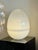 A large Murano glass egg lamp attributed to Carlo Nason for Mazzega. The gorgeous 21" H lamp is made of three parts that...