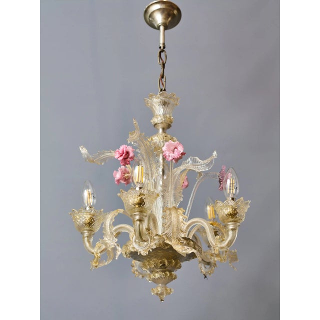 Handmade Venetian chandelier from workshops on Murano, circa 1950s. The chandelier is made of blown and hand-cut glass in...