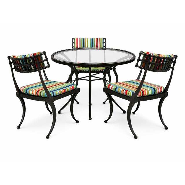 THINLINE 'Klismos' patio dining set, 1960s Painted aluminum, glass, vinyl. Manufactured by Thinline, USA. Table: 27" H x...