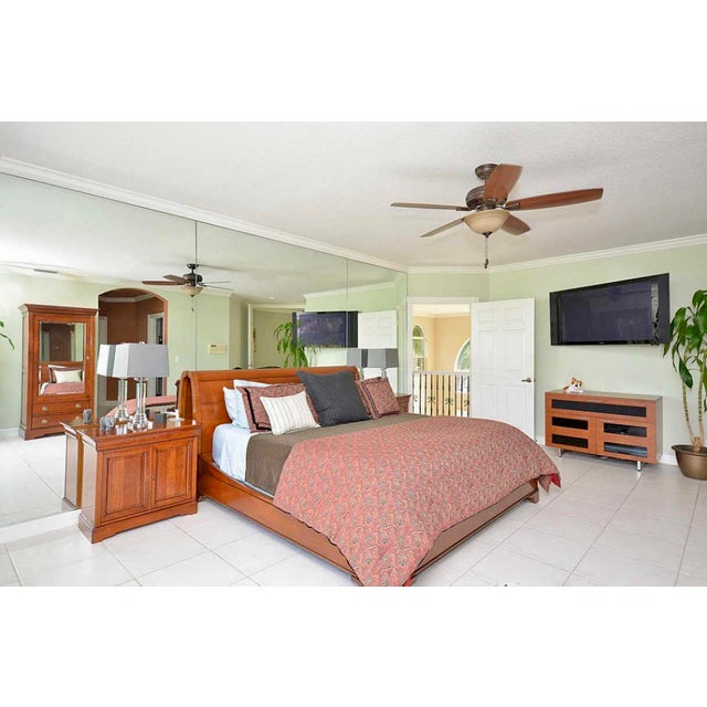 Highlights: Authentic Grange Orléans Collection bed frame. • French-made, solid cherrywood construction. • Classic sleigh...