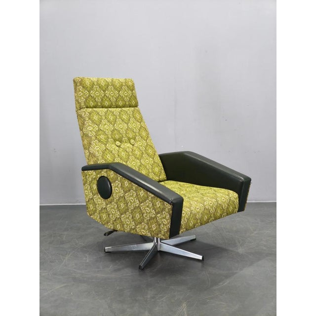 Mid-century reclining armchair produced in Czechoslovakia during the 1970s. This functional and visually distinctive piece...