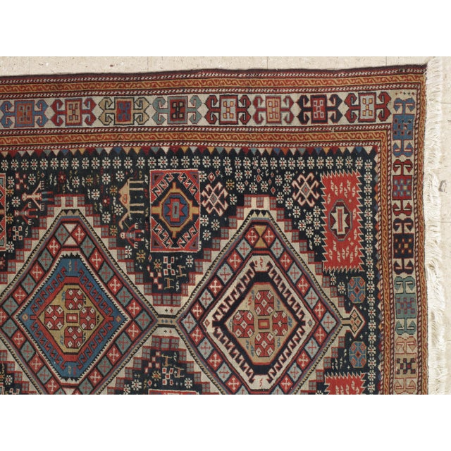 Antique Shirvan rugs of the Caucasus are known to enthusiasts as small pieces with finely detailed all-over repeat...
