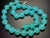 The Peking glass has a soft, milky translucency, in aqua-blue hue, with a subtle inner glow. Necklace is strung with...