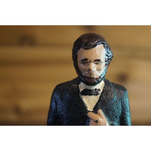 A heavy duty cast iron Abe Lincoln doorstop figurine which comes from the Victorian Era. In very good condition. Measures...