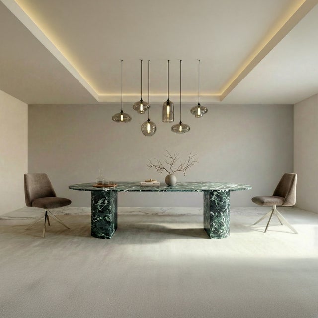 Our Refleko luxury table, with its oblong shape, evokes the reflections of sunlight on dormant quarries, perpetuating the...