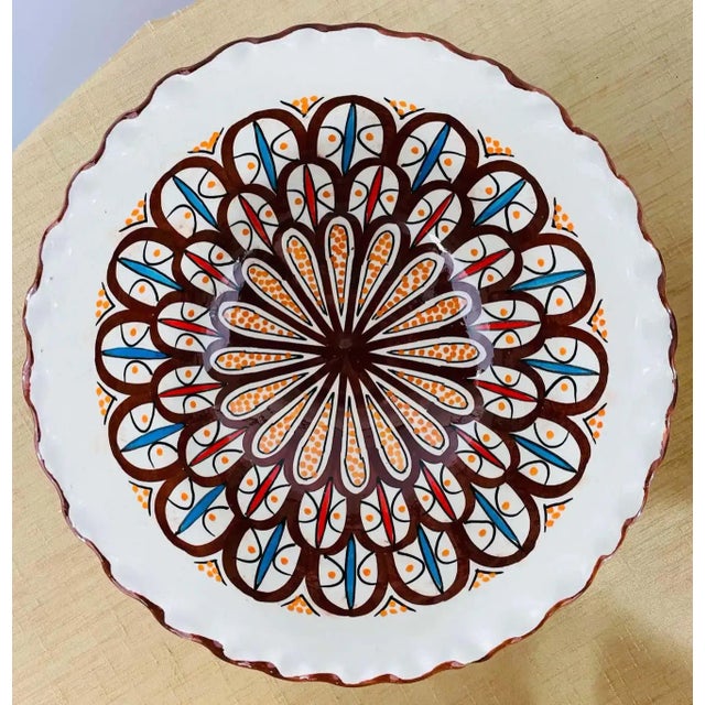A pair of Boho Chic handmade ceramic large bowls. These stunning bowls feature an arabesque pattern and an entrancing...
