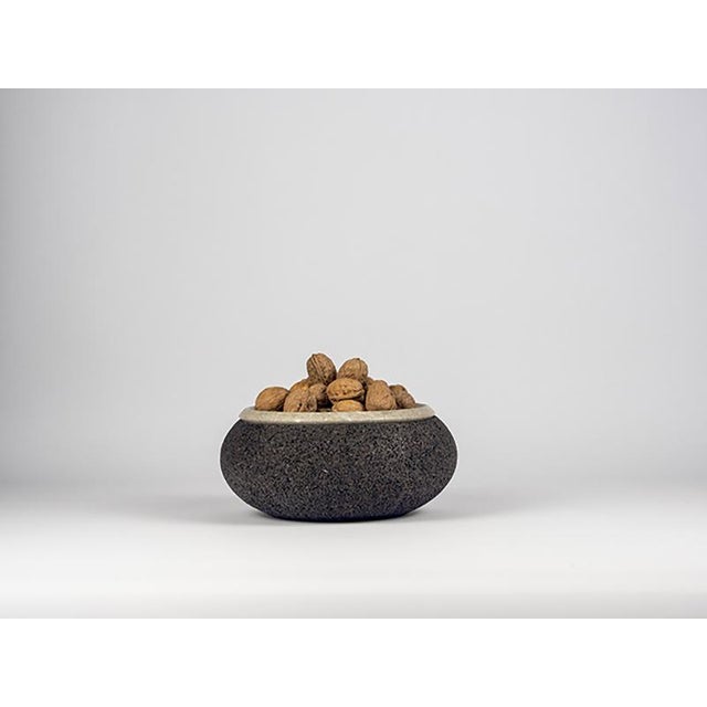 Cork and beige and gray Grolla marble generate a new collection, minimal in the sign but with great attention to its eco-...