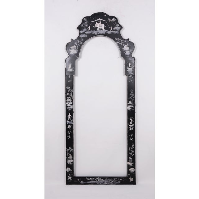 A black and white painted Chinoiserie tole mirror with elephant, figurines, and landscape. Various style pagodas together...
