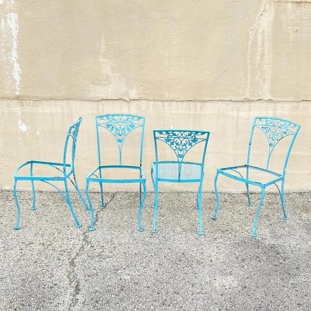 Vintage Woodard Orleans Pattern Wrought Iron Garden Patio Dining Chairs - Set of 4. Circa Mid 20th Century. Measurements:...