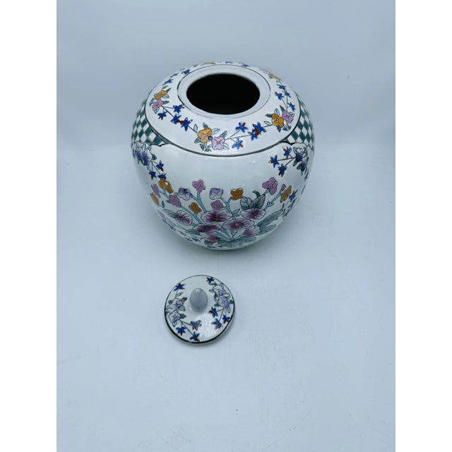 This pretty ginger jar has a really unique design. A checkered design is at the top which nicely compliments the...