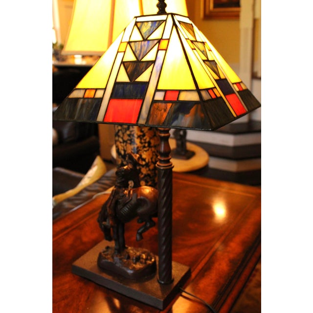 Remington Bronze "The Outlaw" Table Lamp w/ Stained Glass Shade in Mission Style. The lamp is in great condition and works...