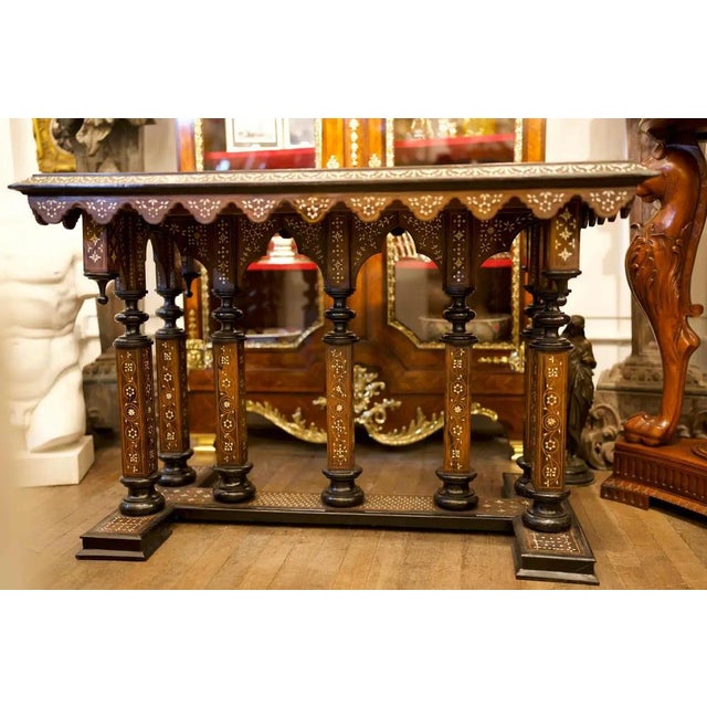 A beautiful 19th century Italian Renaissance style Inlay centre table. The inlay is of elaborate floral designs together...