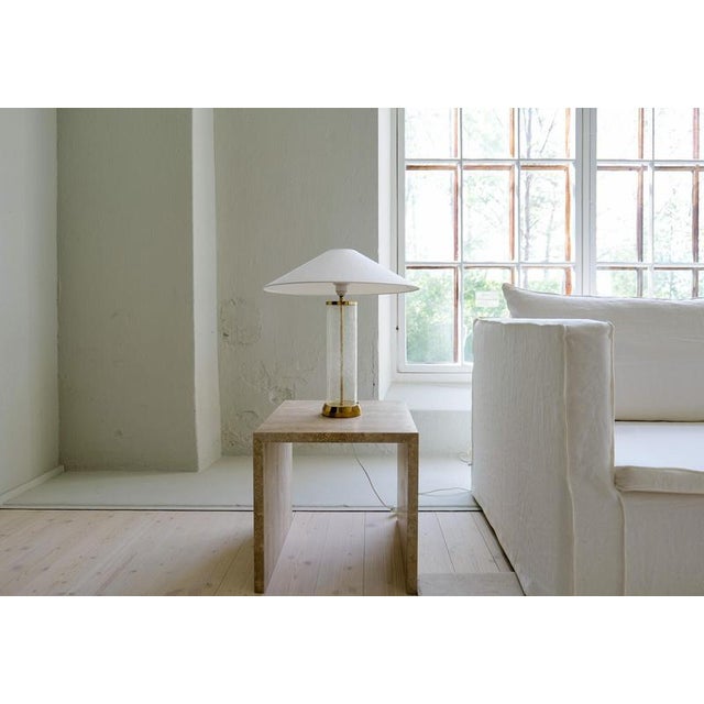 This glass and brass table lamp were produced by bergboms lamp factory in sweden. Wonderfully glass that goes well with...