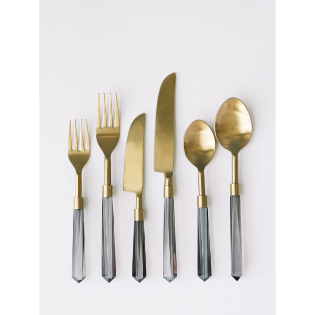 The PRISM Collection was designed to be sleek, contemporary, and geometric. With a slender handle and unique color...