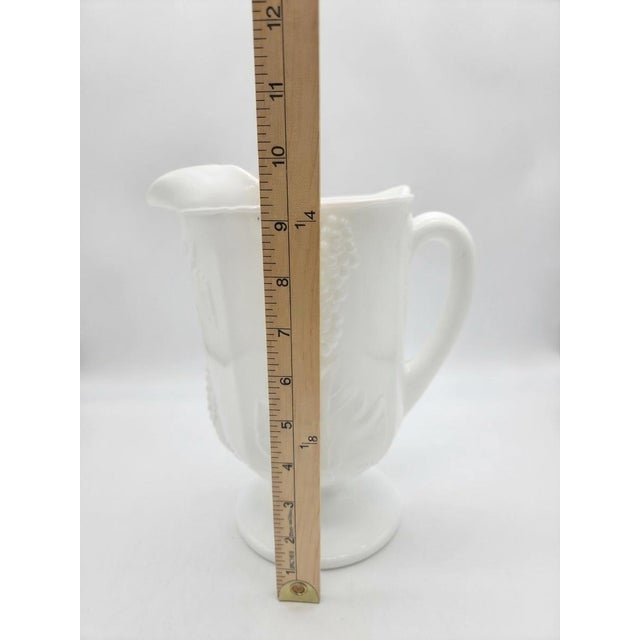 Vintage Milk Glass Footed Pitcher With Embossed Grape and Vine Pattern For Sale - Image 4 of 6